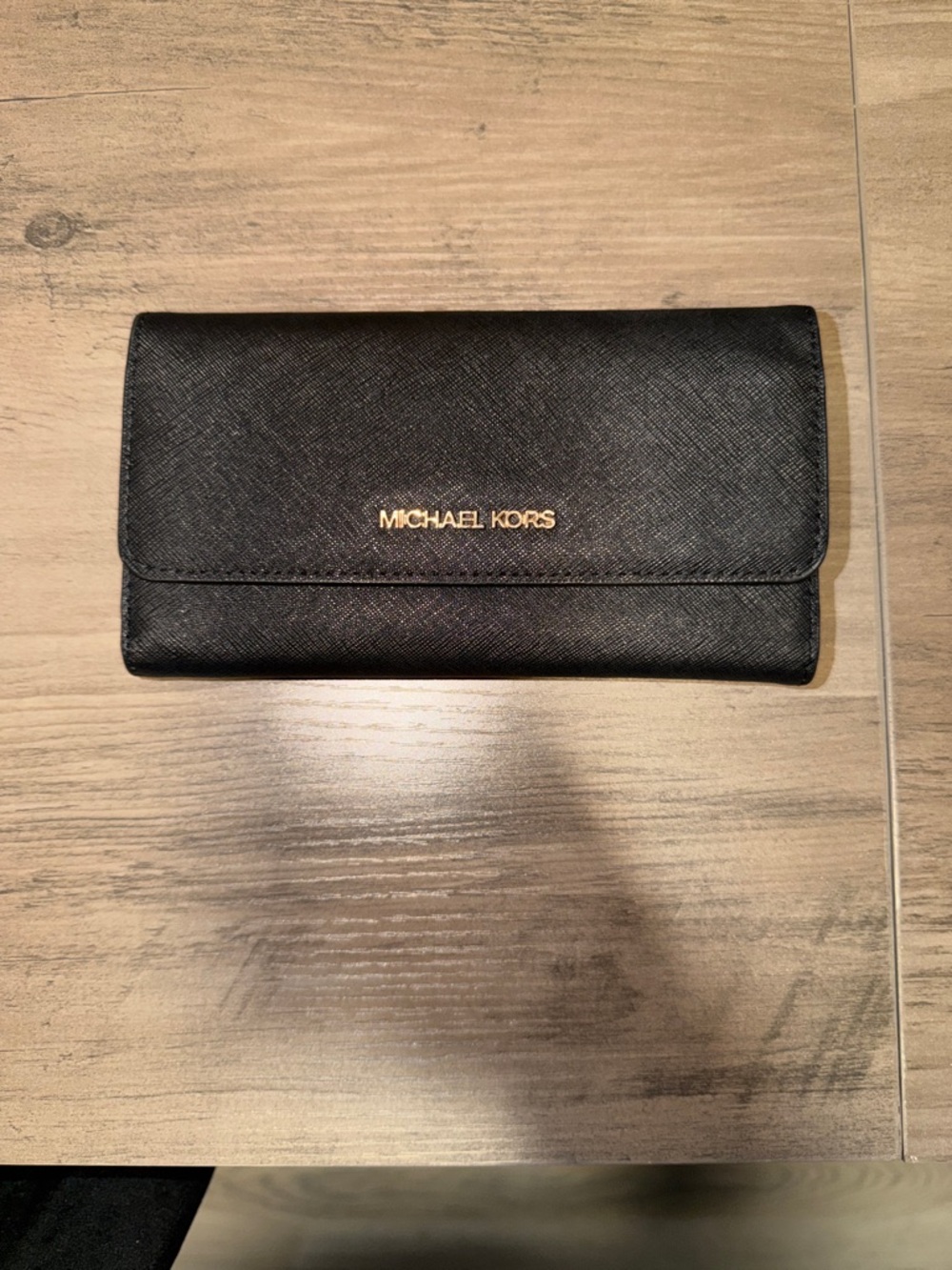 Michael Kors Black Saffiano Foldover Wallet with Gold Logo